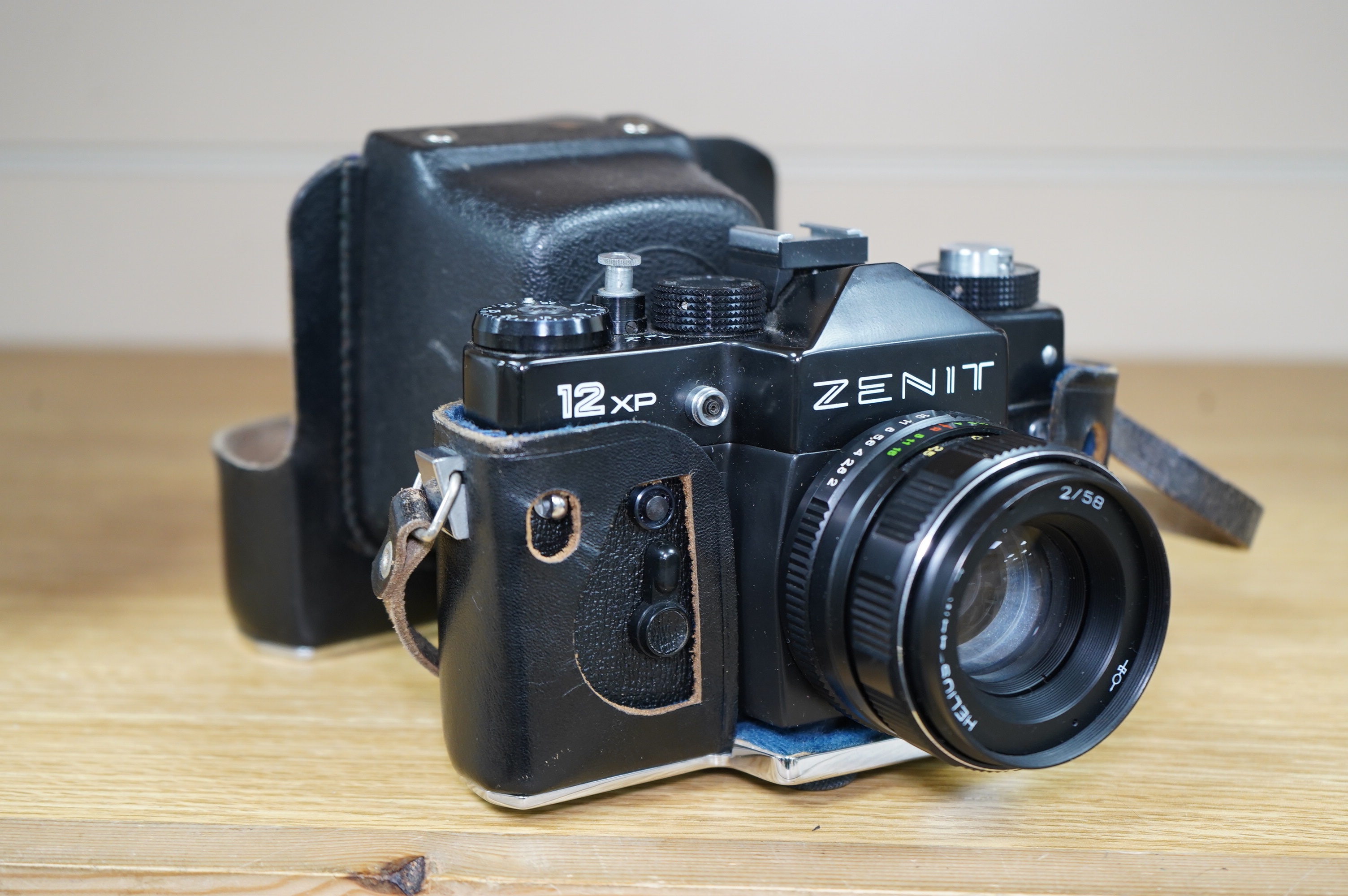 A Zenit 12XP camera with case. Condition - appears to be fair